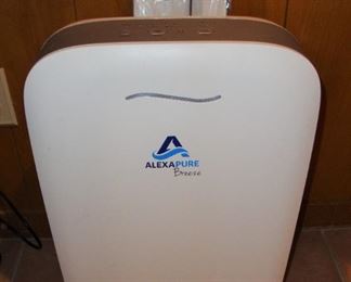 AIR PURIFIER WITH A NEW FILTER STILL IN THE BOX