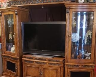 Beautiful entertainment center, There are also 2 matching corner cabinets.  Flat screen television