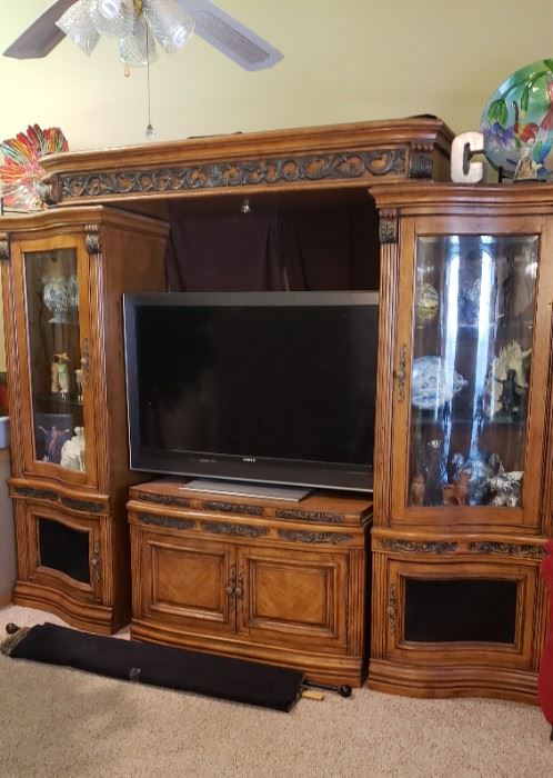Beautiful entertainment center, There are also 2 matching corner cabinets.  Flat screen television