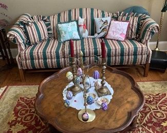 Camel back sofa, rug, coffee table, Easter decor