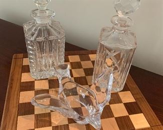 Liquor bottles, wood chess board
