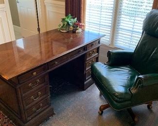Large desk, leather rolling chair