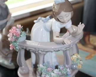 Girl on balcony with flowers Lladro