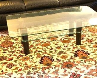 Two-tier glass coffee table
Dimensions: 48”L x  27”W x 13.75”H
Price:$195