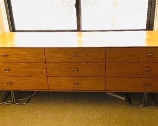 MCM teak nine-drawer dresser on turned metal legs. (Two matching bedside tables also available.)
Dimensions:71.25”L x 28.5”H x 19”D
Price:$850