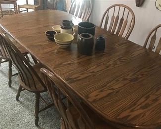 Heavy oak carved table with six chairs