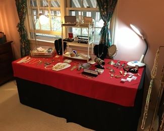 Lots of vintage and costume jewelry, some sterling.  Fine jewelry in downstairs showcase