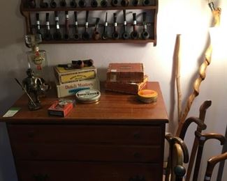 Pipes and chest of drawers