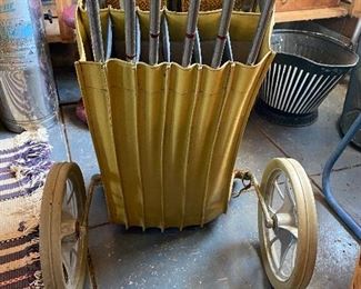 Vintage golf cart and clubs $65