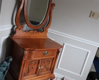 antique  wash stand table with  beveled  mirror.  it  is  30" wide  and  19"  deep.     275.00 