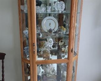 lighted   curio  cabinet     3' wide and 6'3" high              150.00  THE  CABINET    IS  SOLD.