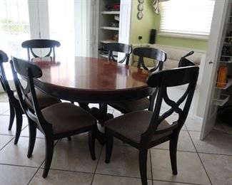 dinette  set(in  kitchen) with  6  chairs---  the  chairs  are  sold