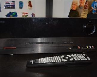 Harman / Kardon receiver - AVR 154.  Pairs well with the Polk speakers. 