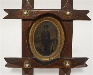 1126 IMAGE OF CIVIL WAR SOLDIER WITH HAND COLORED AMERICAN FLAG WITH 36 STARS, 9 IN X 8 1/4 IN OVERALL