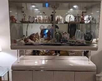 Display cabinet with storage