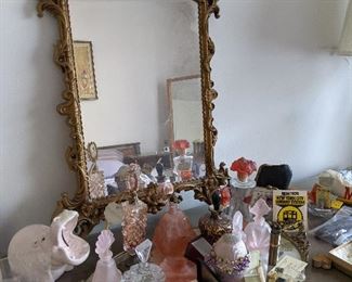 Gold detailed mirror / perfume bottles