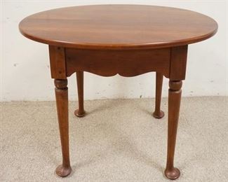1084	CHERRY OVAL QUEEN ANNE STYLE LAMP TABLE, 28 IN X 22 IN X 24 IN
