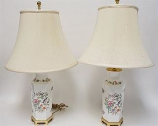 1119	PAIR OF ASIAN STYLE DECORATED POTTERY TABLE LAMPS ON BRASS BASES MARKED CRESCENT. 29 IN H 
