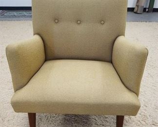 1154	MID CENTURY MODERN UPHOLSTERED ARM CHAIR. 28 IN W 37 IN H 
