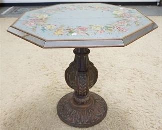 1156	OCTAGONAL PEDESTAL TABLE W/ HAND PAINTED GLASS TOP. PEDESTAL IS CARVED TOP HAS A MIRROR RIM . 30 1/4 IN ACROSS THE TOP. 28 3/4 IN H. 
