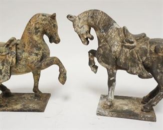 1168	PAIR OF CAST IRON ASIAN HORSES, LARGEST IS 11 IN LONG X 9 3/4 IN HIGH
