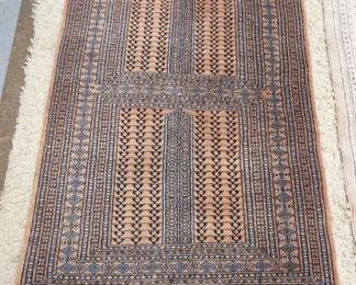 1207	ORIENTAL THROW RUG, DAMAGE ON SIDE, 38 IN X 61 IN
