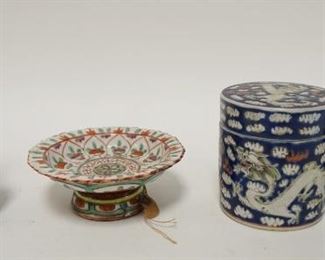 1219	4 PIECES OF ASIAN POTTERY INCLUDING COVERED JAR, COMPOTE & VASE, LARGEST VASE IS 5 1/2 HIGH
