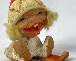 Henning Hand-Carved Norwegian Wooden Figure of Little Blonde Toddler Sitting on Red Skis - "Snowflake"