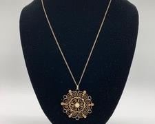 1-1/2" diameter dainty Norwegian style filigree medallion with white "pearl" bead center. Excellent condition. Hallmark difficult to read but appears to say 830S. See photo. No hallmark found on the chain. Wt. 7.2 gm. including chain.