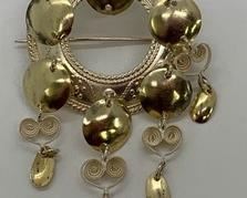 Leif J Hansen Norwegian Gilt Sterling Solje Brooch. Leif Johan Hansen was a Norwegian silversmith, active 1948-1977. The piece is in very fine condition but is missing 2 dangling filigree elements. Has a C clasp and tube hinge. Dimensions: 1.5" w x 2-5/8" l. Wt. 9.4 gm. Marked "LJH 830S".