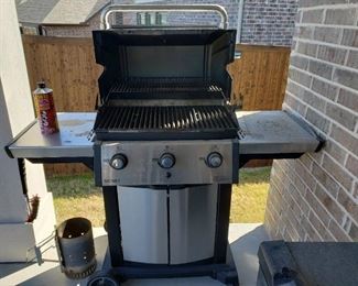 Gas Grill Broil king used, with propane bottle, item to lower left DOES NOT go with grill List price $200.00