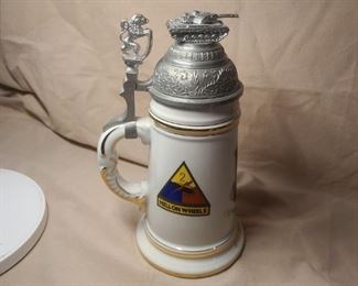 WW2 Allied( USA) German made stein for Lt. Col. Egger, the 48th Armed, Med. BN. with Lithopane on bottom interior( nude woman)* tank on top of lid(rare) Hell on Wheels emblem*gold plating is impeccable condition* lid has very light wear along rim in front. 770-846-3227 to by now