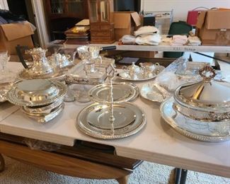 multiples of silver plate servers for banquets, parties, get together's; look nice;