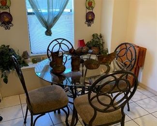 cute iron and glass kitchen table and chairs