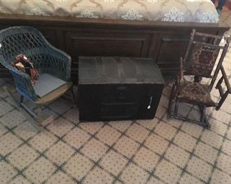 Small Child’s size Antique Trunk, Antique Child’s wicker rocker, Antique Child’s Carpet Rocker