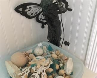 Butterfly fairy statue. Seashells