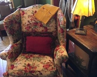 Overstuffed Floral Chair, Antique Table, Stained Glass Lamp