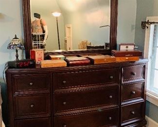 A handsome dresser and mirror. 