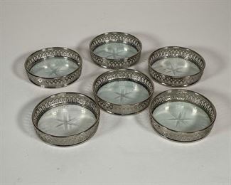 Lot 128 | (6pc) SET GLASS & SILVER-PLATED COASTERS