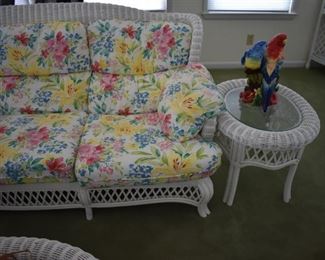 Gorgeous, Like New, and Quality Sun Room White Wicker Floral Cushioned Sofa. nearly the entire Sun Room  Matches. Just think Quality, Like New and enough pieces to fill Your Sun Room! Why not purchase the entire matching set!