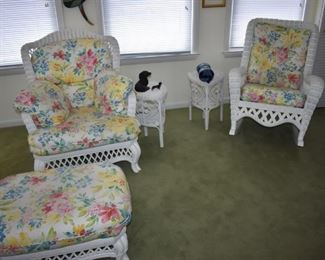 Gorgeous, Like New, and Quality Sun Room White Wicker Floral Cushioned Chair with Ottoman and Rocker. nearly the entire Sun Room  Matches. Just think Quality, Like New and enough pieces to fill Your Sun Room! Why not purchase the entire matching set!