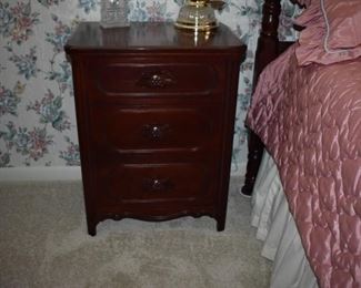 Davis Cabinet Company "Lillian Russell" Bedroom Set in Beautiful Condition consisting of 4 Poster Bed, Nightstand and Gorgeous Dresser with  7 Drawer Dresser, Glove Box and Trinket Top Drawers and Absolutely Lovely Ox-Bow Shivel and Oval Mirror with loads of Pillows on the Bed! 