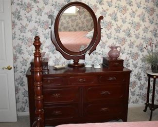 Davis Cabinet Company "Lillian Russell" Bedroom Set in Beautiful Condition consisting of 4 Poster Bed, Nightstand and Gorgeous Dresser with  7 Drawer Dresser, Glove Box and Trinket Top Drawers and Absolutely Lovely Ox-Bow Shivel and Oval Mirror with loads of Pillows on the Bed! plus Marble topped Fern Stand