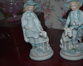Bisque Figurines of Victorian Boy and Girl with their Pet Dogs