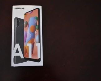 Samsung Galaxy A11 Phone New the Clear Seal has never been removed from this phone as well as the Attachments 