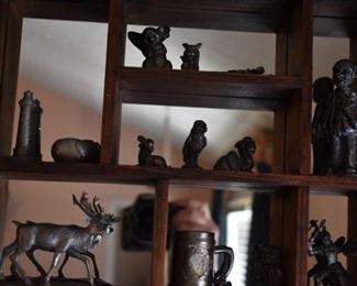 Vintage Pewter Figurines on Mirrored "What-Not" Shelf - Figurines include: Reindeer, Stein, Lighthouse, Warrior, Camel,  Man in Frumpled Suit,  Monkey's, Penquin, Frog,  and Much More!