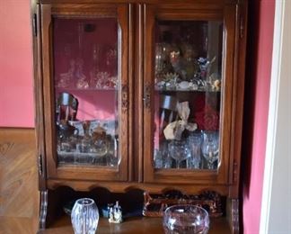 This Beautiful Vintage Cabinet  has double glass door Hutch Top and Cabinet bottom. Just look at all the Crystal and Collectibles!