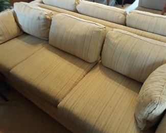 Pair of designer sofas with mid-century flair. Circa 1980's.