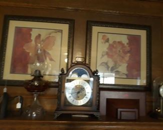 Hamilton Moonphase Mantel clock with wall shelf, hurricane kerosene lamp, antique copper kettle, and art.