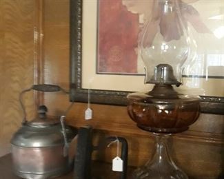 Cast iron, copper kettle, and Queen Anne No. 2 Kerosene Hurricane lamp.